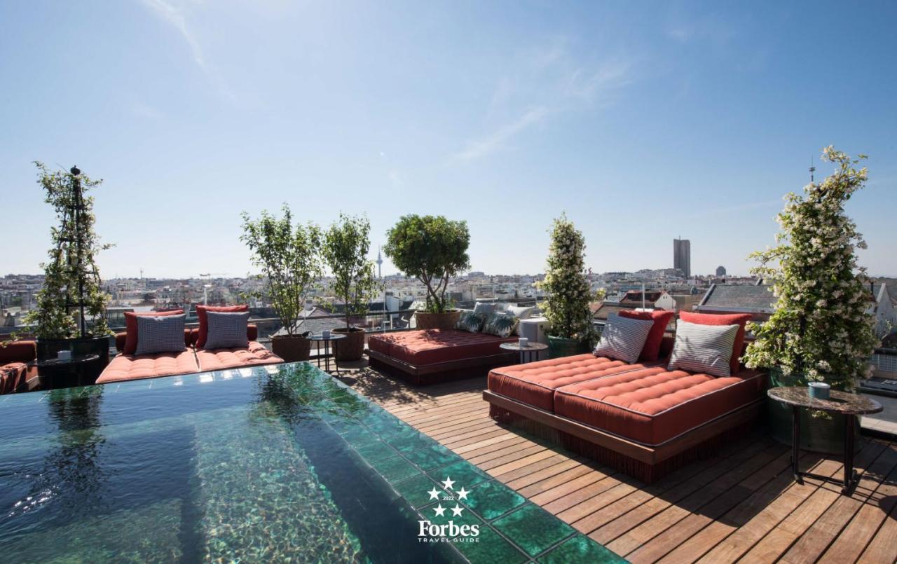 Bless Hotel Madrid - The Leading Hotels Of The World Bagian luar foto The rooftop pool at the Forbes Hotel